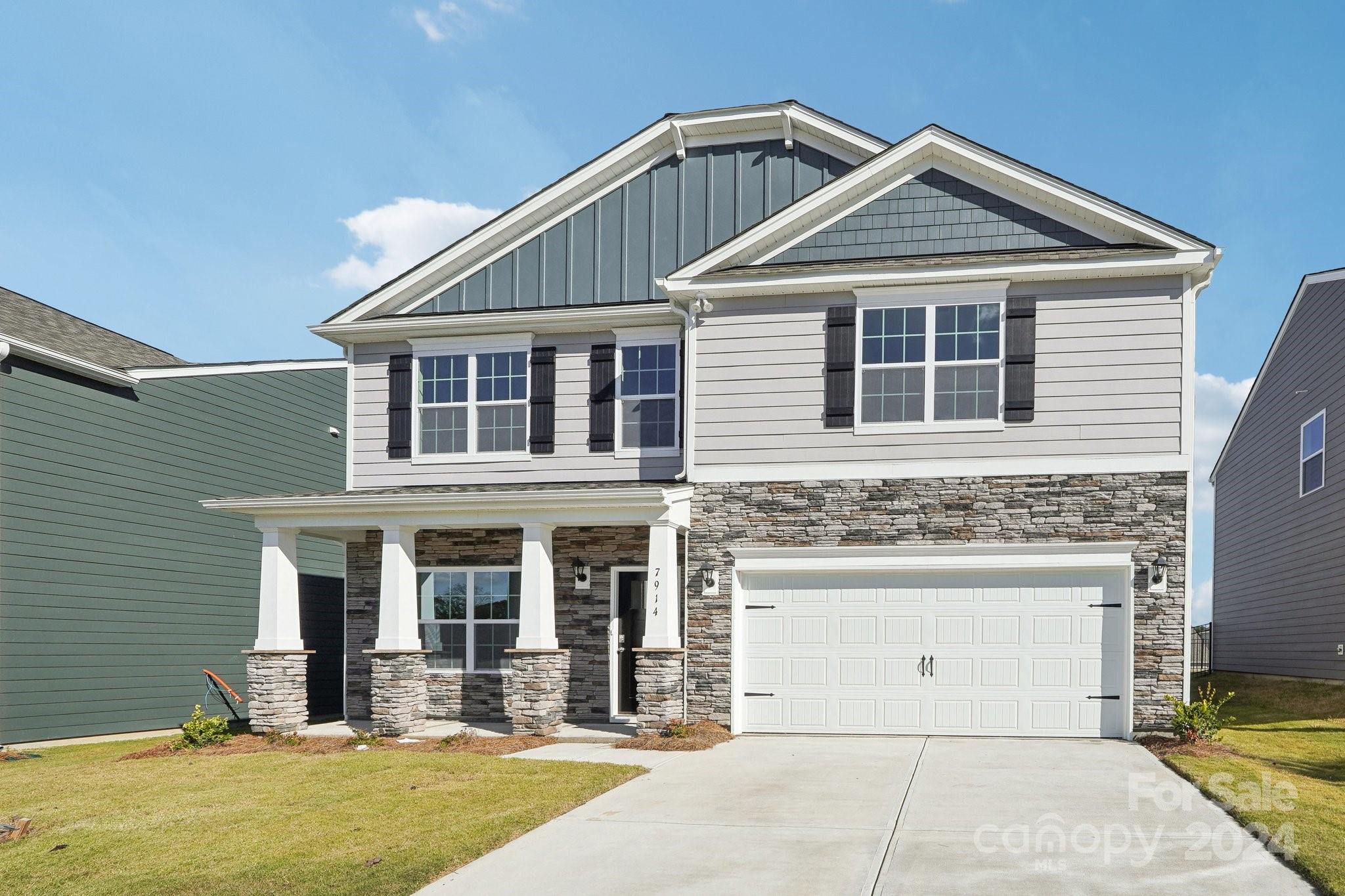 7914 Old Brk Road Sherrills Ford, NC 28673 - Photo 3 of 41 a front view of a house with a yard