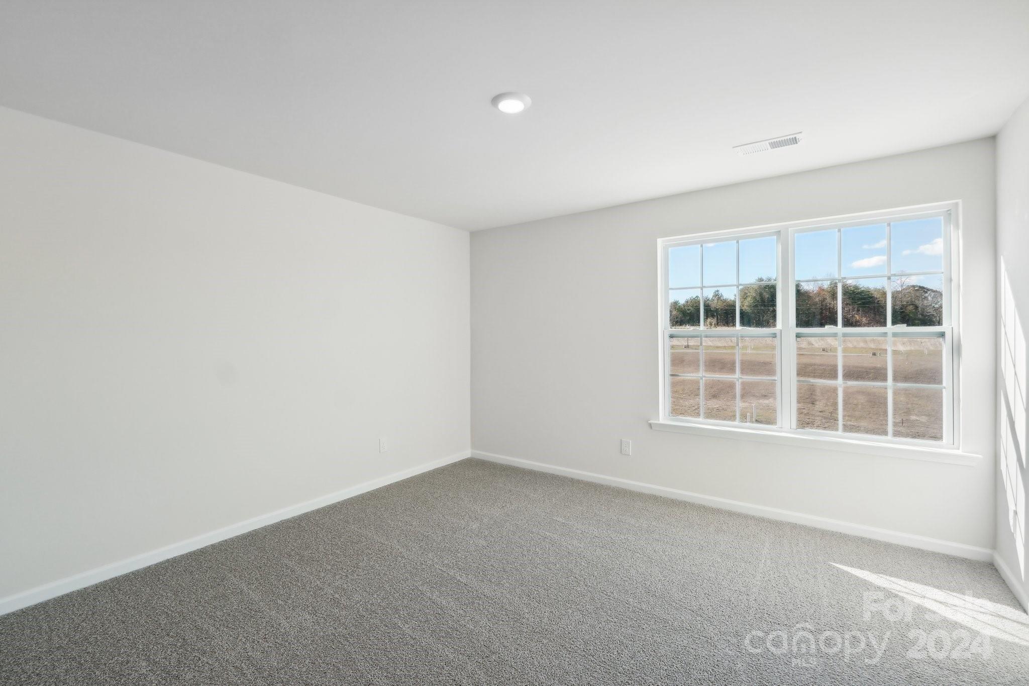 7914 Old Brk Road Sherrills Ford, NC 28673 - Photo 31 of 41 an empty room with a window