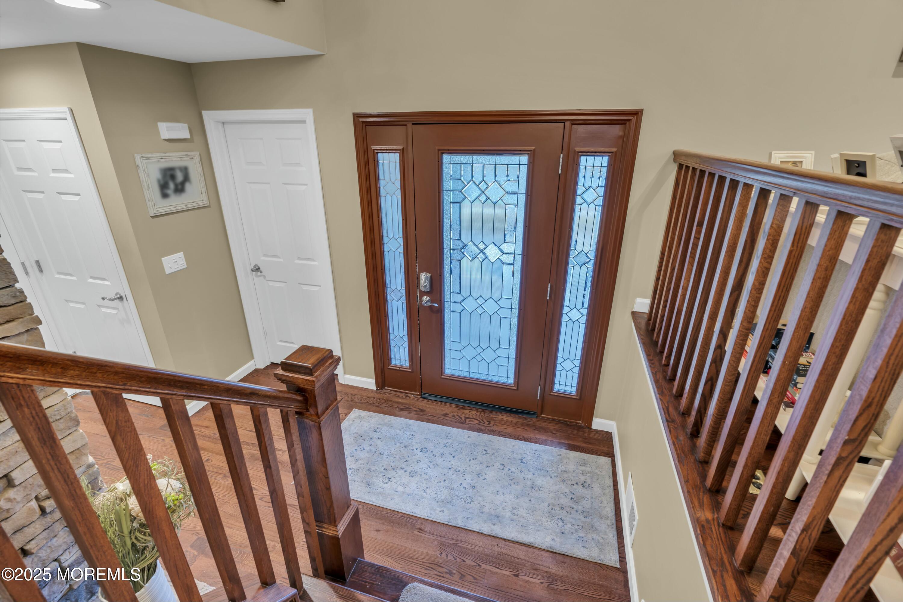 16 Glenarden Drive Howell, NJ 07731 - Photo 15 of 63 a view of a room with staircase and door
