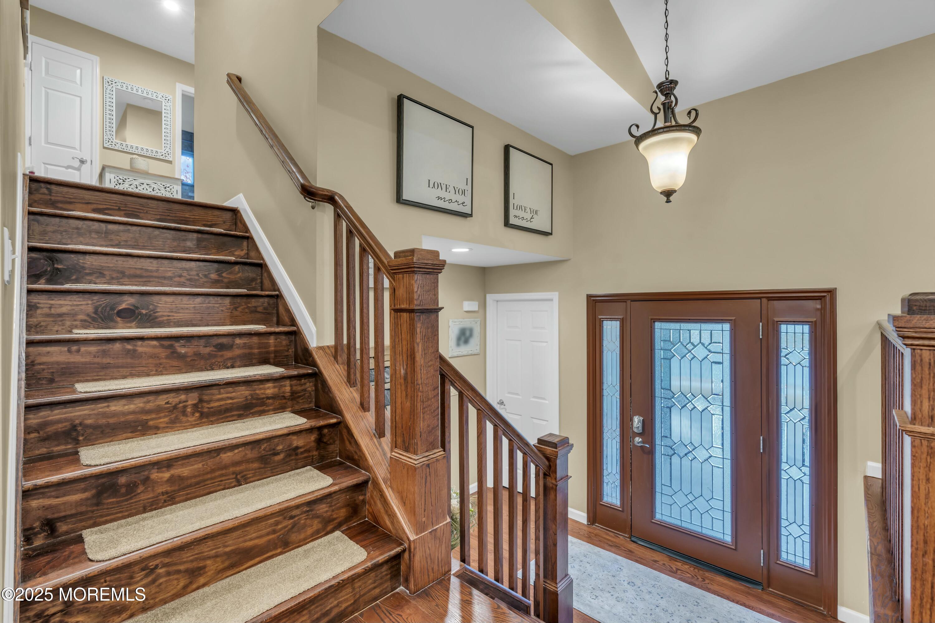 16 Glenarden Drive Howell, NJ 07731 - Photo 16 of 63 a view of entryway and hall with wooden floor