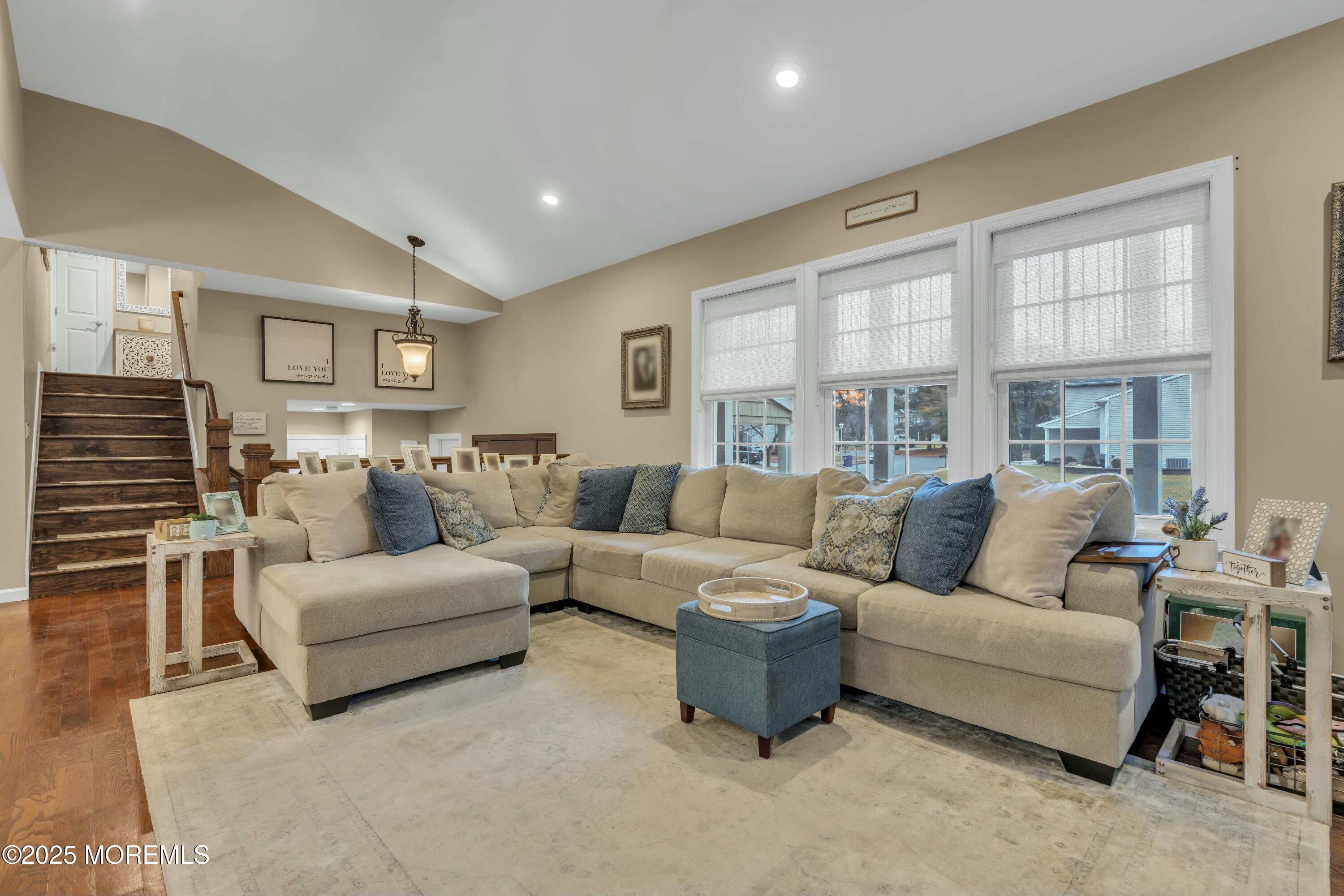 16 Glenarden Drive Howell, NJ 07731 - Photo 24 of 63 a living room with furniture and a flat screen tv