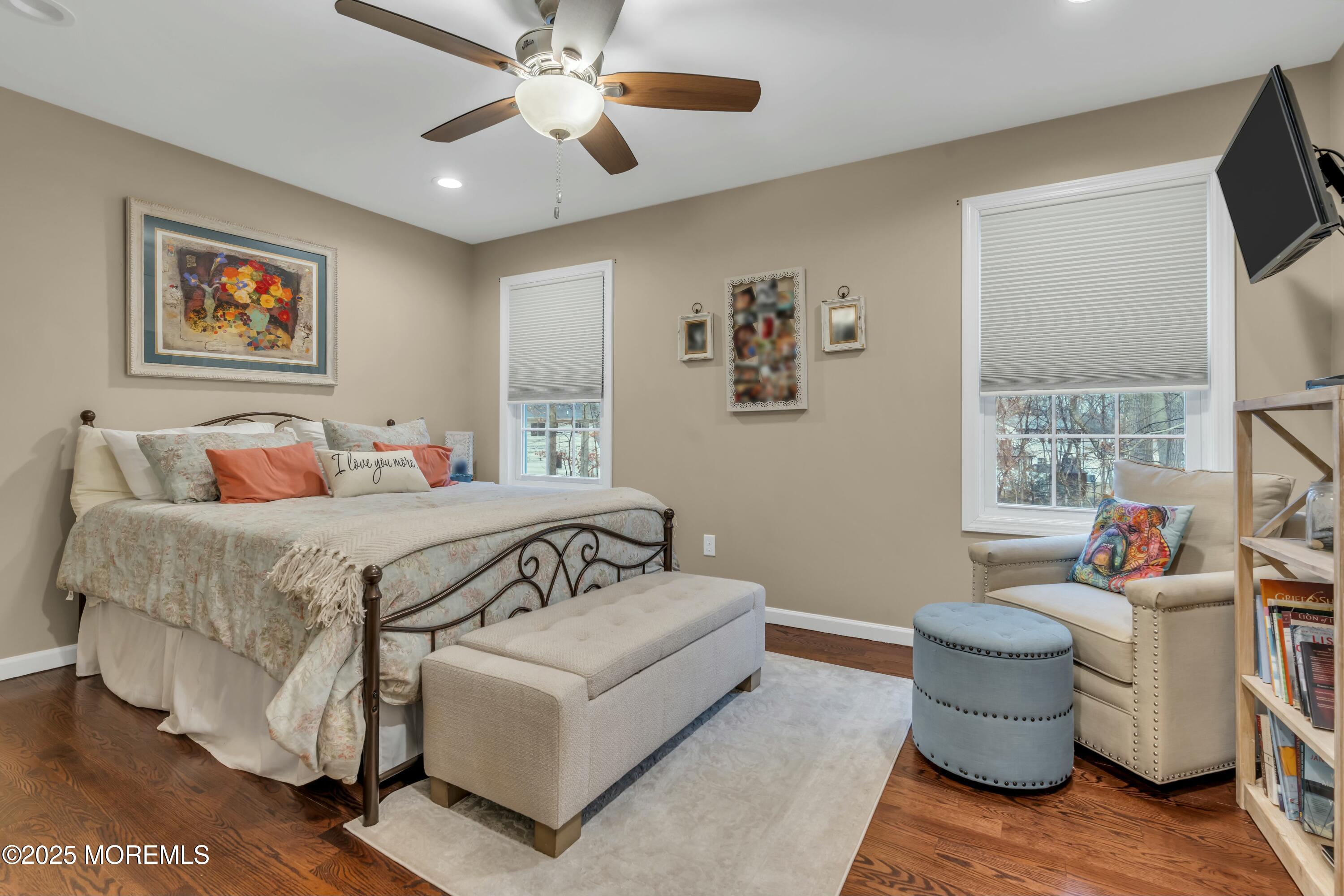 16 Glenarden Drive Howell, NJ 07731 - Photo 40 of 63 a bedroom with a bed and ceiling fan