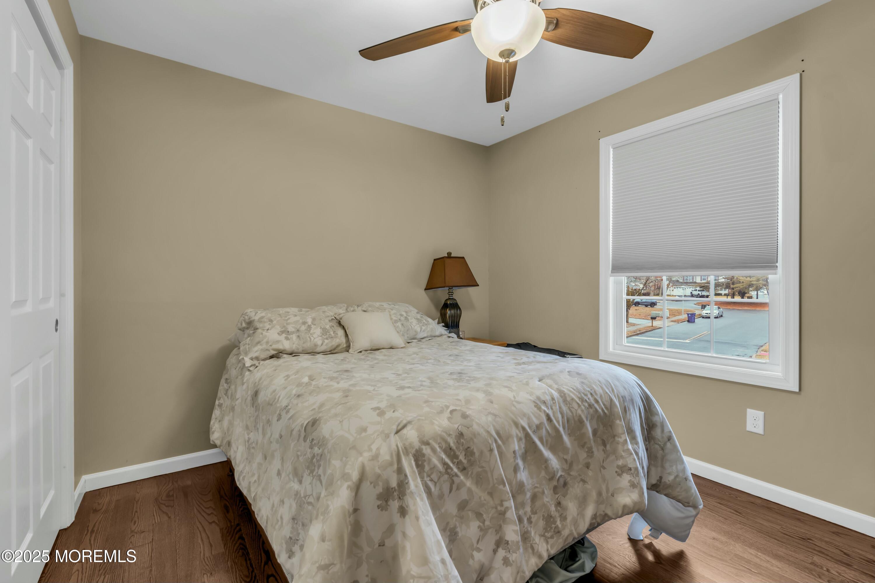 16 Glenarden Drive Howell, NJ 07731 - Photo 43 of 63 a bedroom with a bed and a painting on the wall