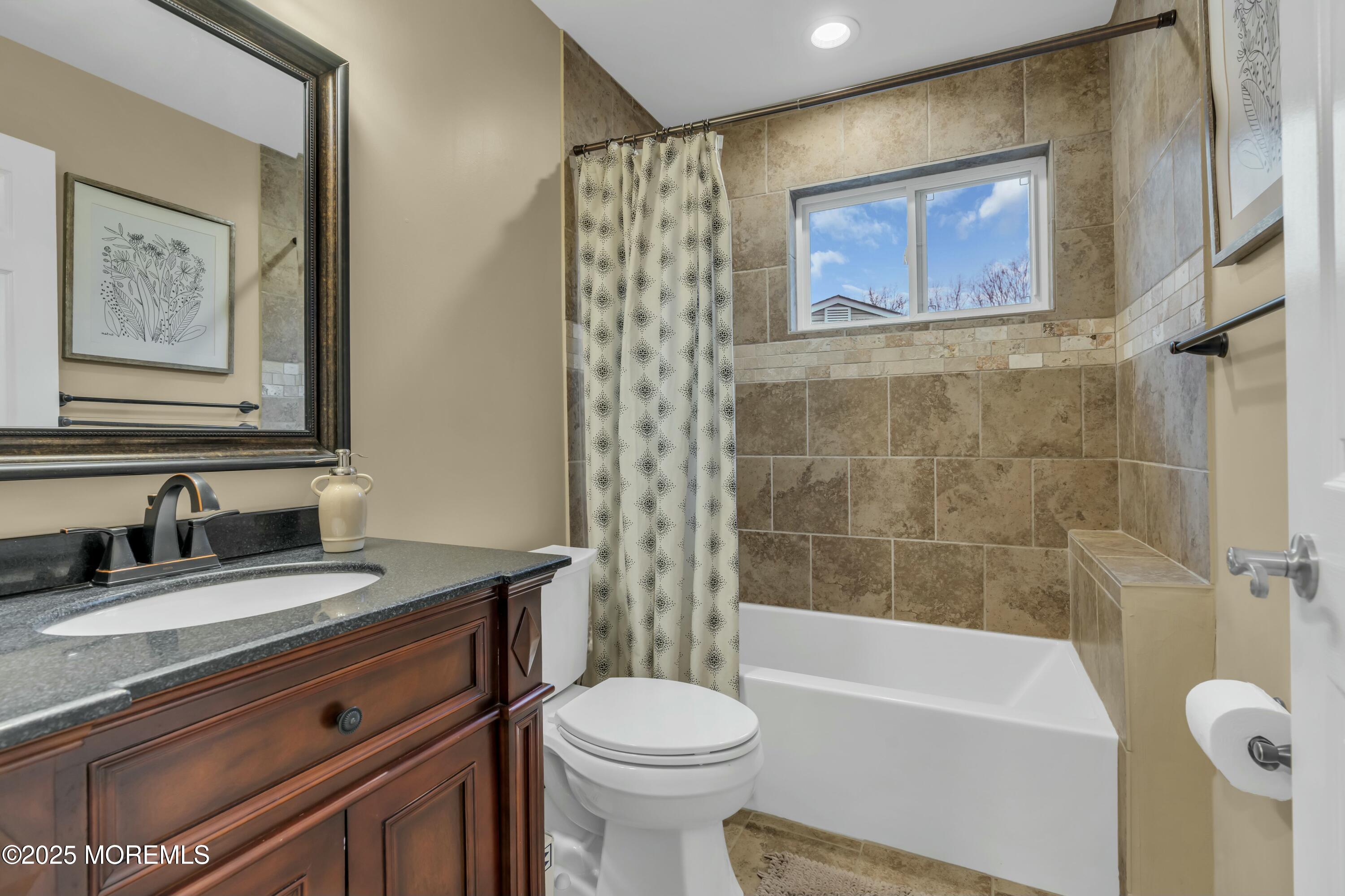 16 Glenarden Drive Howell, NJ 07731 - Photo 45 of 63 a bathroom with a sink a toilet and shower
