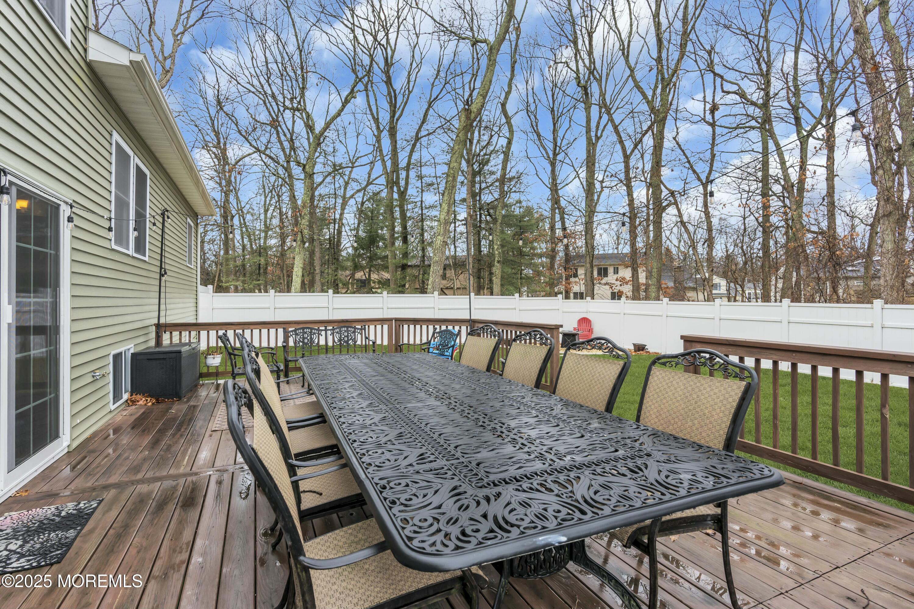 16 Glenarden Drive Howell, NJ 07731 - Photo 50 of 63 a view of balcony with wooden floor and outdoor seating