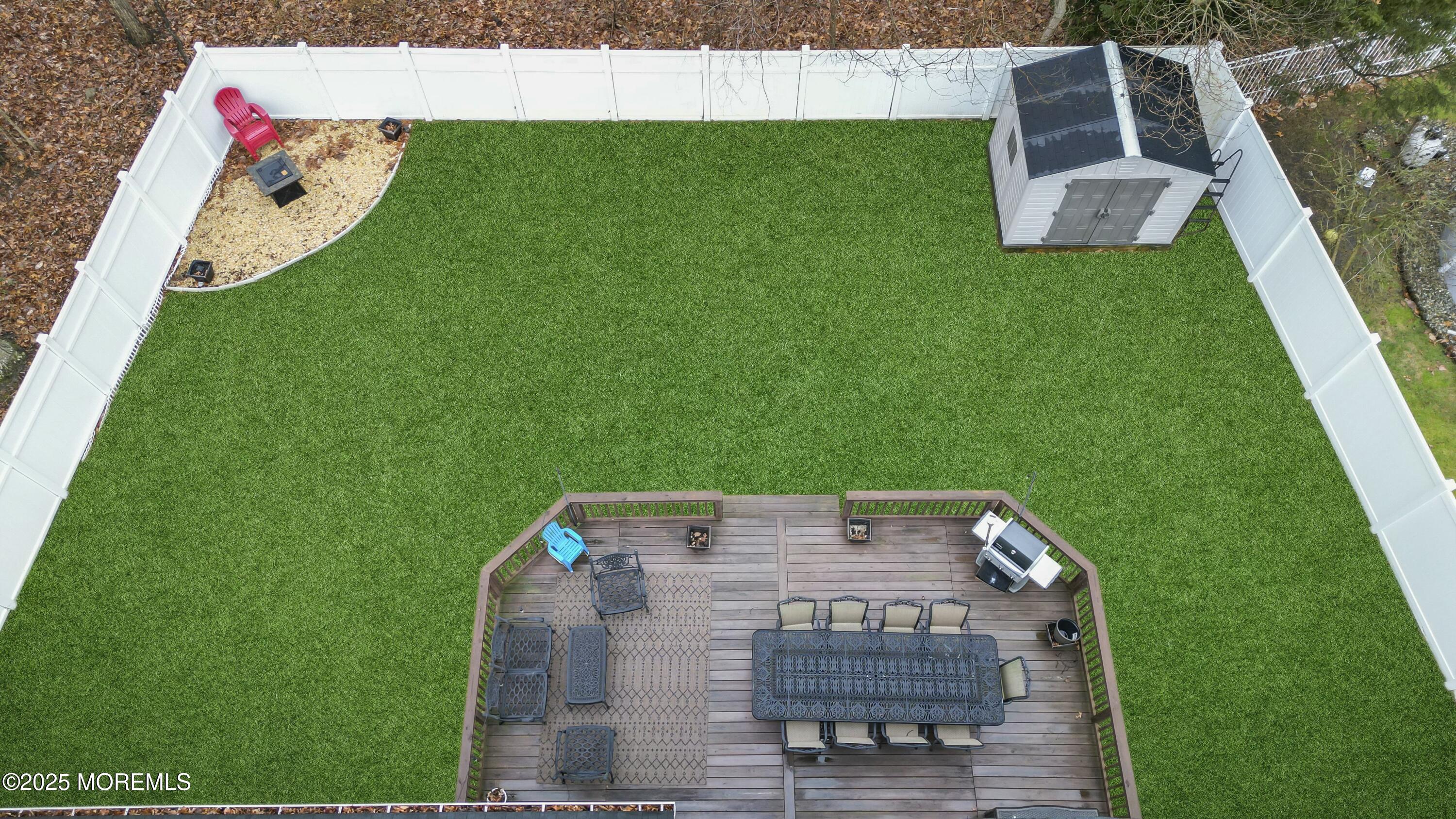 16 Glenarden Drive Howell, NJ 07731 - Photo 58 of 63 a view of an house with backyard space and seating area