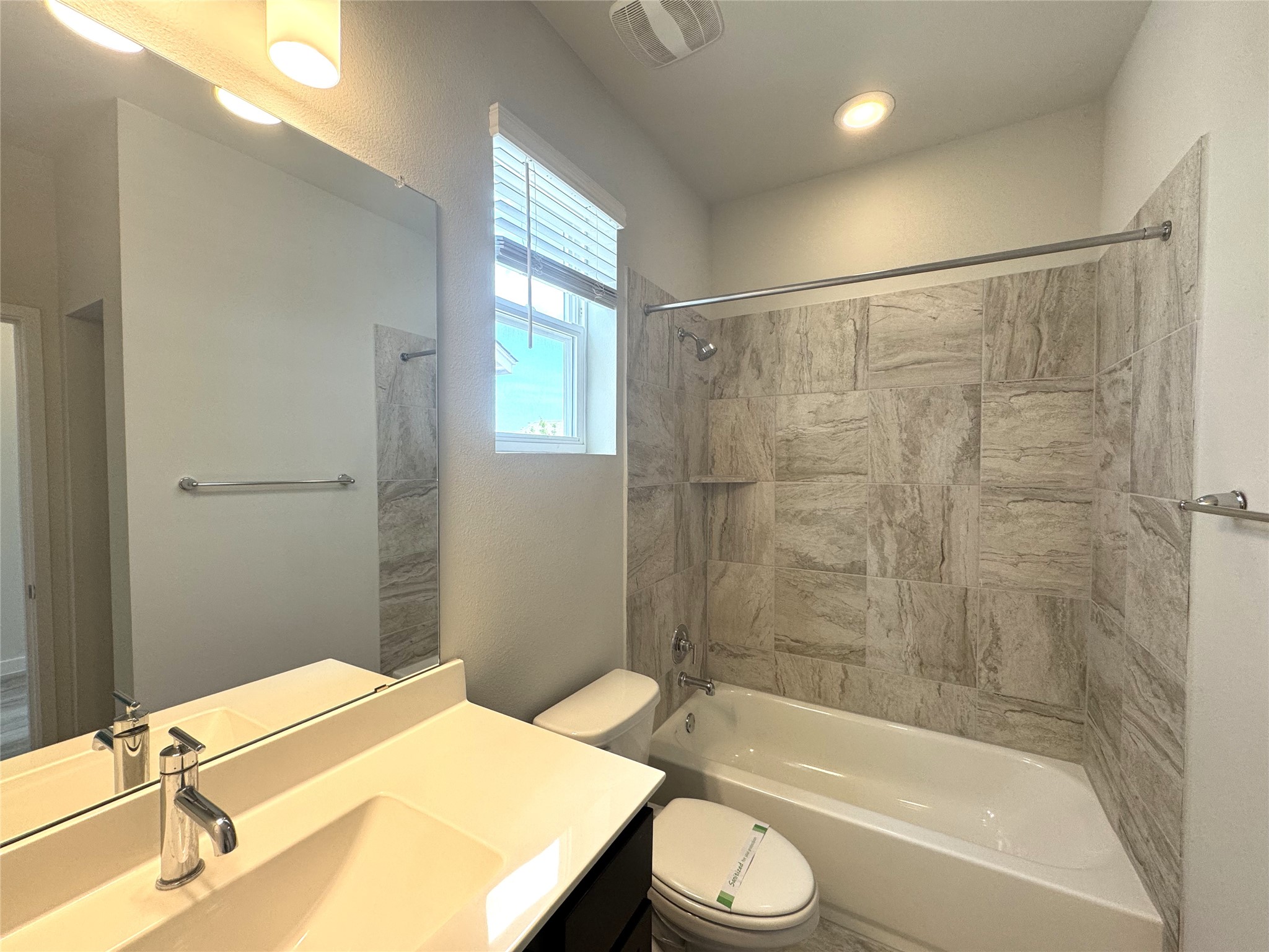 15102 Ryman Road Pflugerville, TX 78660 - Photo 9 of 12 a bathroom with a sink and a bathtub