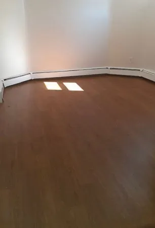 a view of a room with an empty space