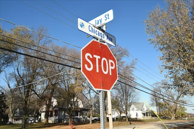 a street sign on a pole on a street