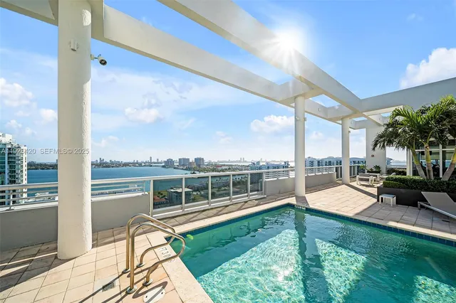 a view of a lake with a patio