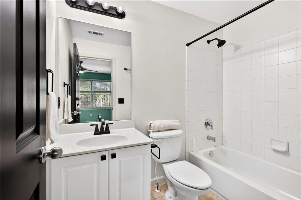 167 Calming Water Trail Dallas, GA 30132 - Photo 31 of 64 a bathroom with a sink toilet and shower