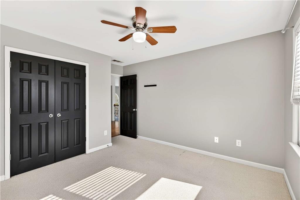 167 Calming Water Trail Dallas, GA 30132 - Photo 33 of 64 a view of a livingroom with a ceiling fan