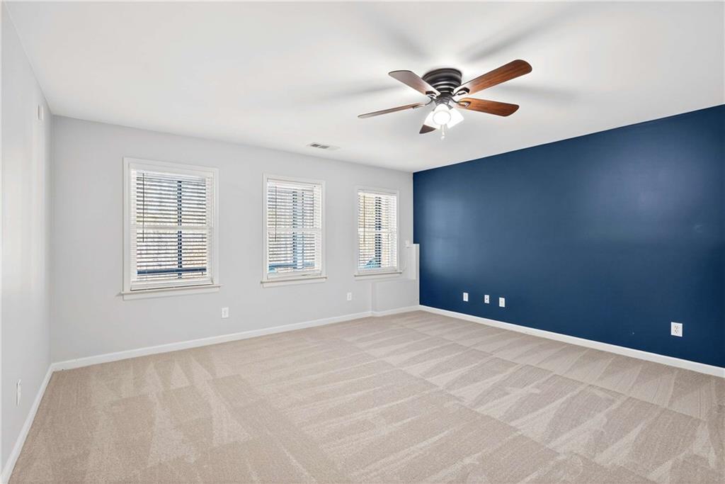 167 Calming Water Trail Dallas, GA 30132 - Photo 41 of 64 a view of an empty room with a window