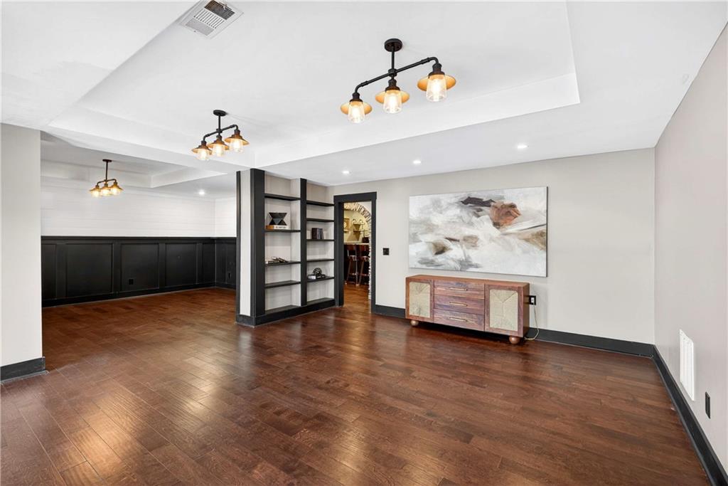 167 Calming Water Trail Dallas, GA 30132 - Photo 46 of 64 a view of livingroom with furniture and wooden floor