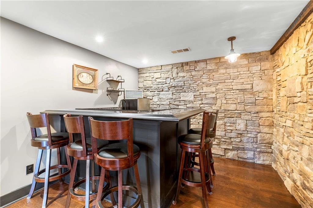 167 Calming Water Trail Dallas, GA 30132 - Photo 48 of 64 a dining room with furniture and window