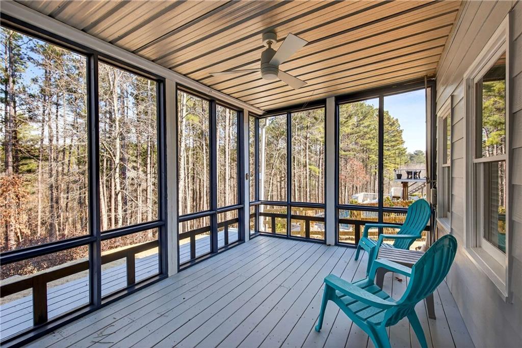 167 Calming Water Trail Dallas, GA 30132 - Photo 51 of 64 a living room with furniture and wooden floors