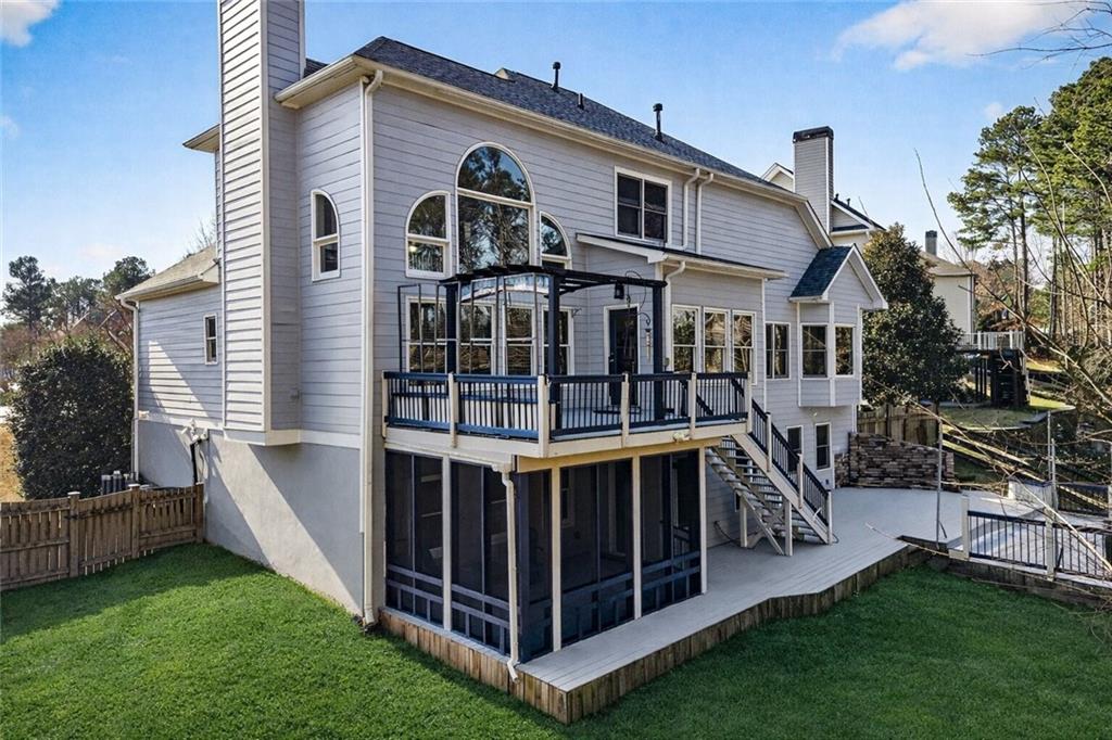 167 Calming Water Trail Dallas, GA 30132 - Photo 57 of 64 a view of a house with a yard