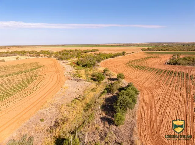 a view of an ocean and a mountain