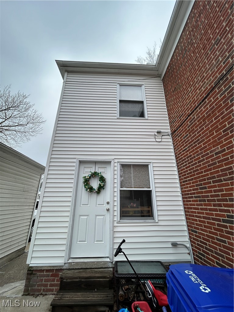 13678 Cedar Road Cleveland, OH 44118 - Photo 2 of 24 back entrance to lower unit
