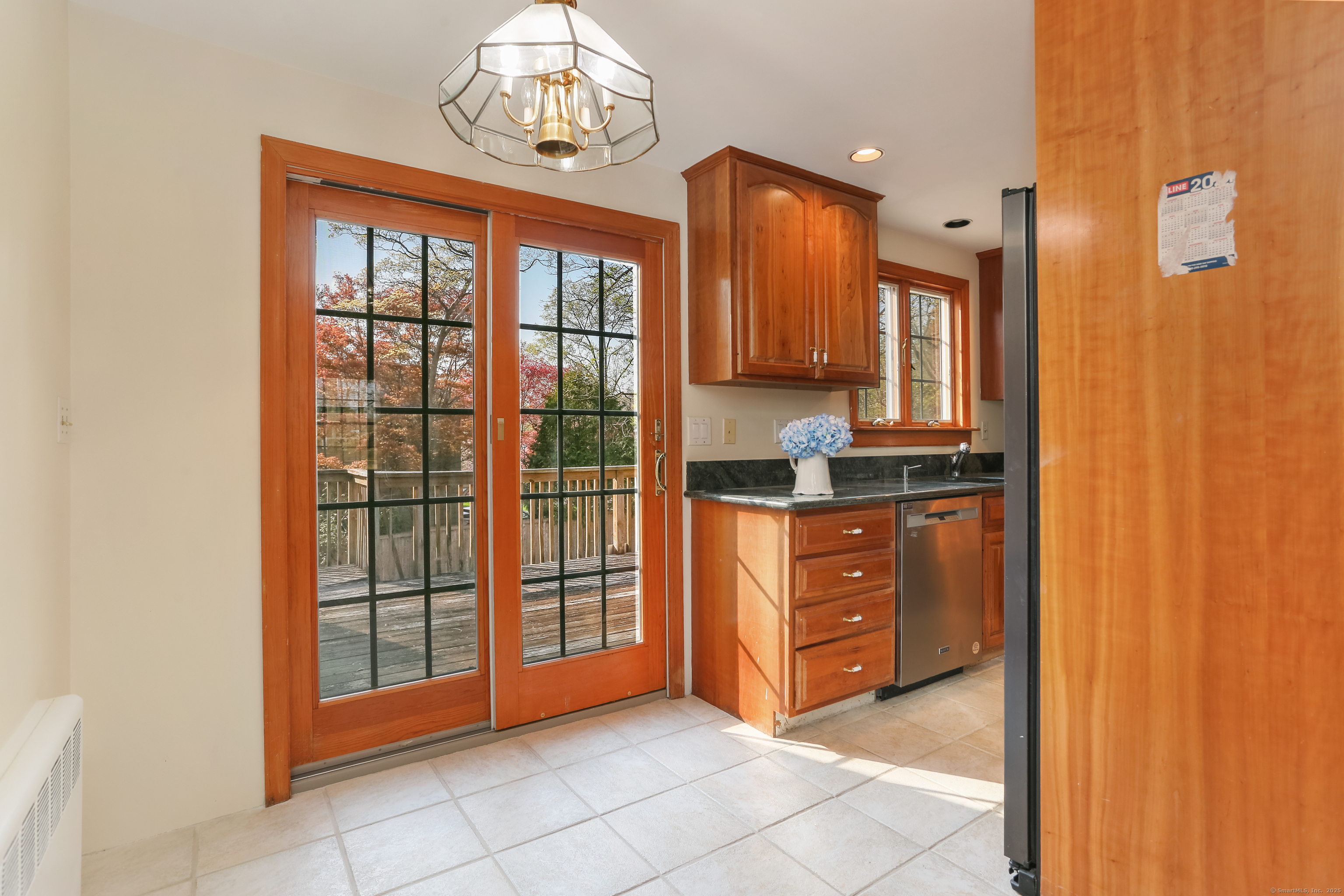 219 Hollow Tree Ridge Road Darien, CT 06820 - Photo 7 of 27 Dining area with access to the deck.