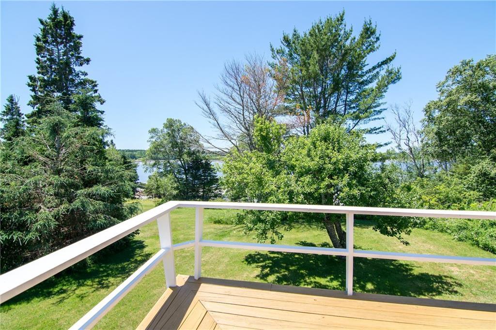 325 Ficketts Point Road Milbridge, ME 04658 - Photo 7 of 35 The back yard and Narragaugus River...