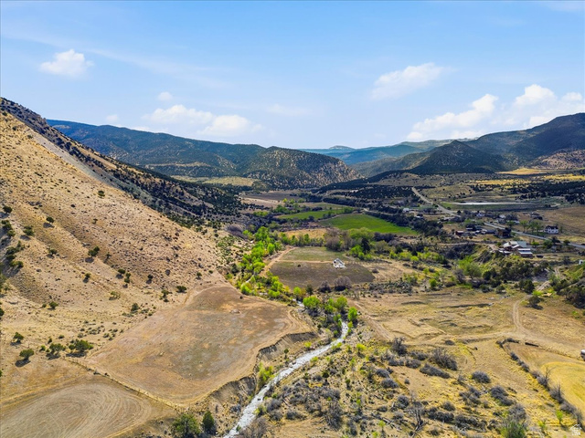 811 East Canyon Road Mayfield, UT 84643 - Photo 4 of 57 Expansive mountain and valley landscape featuring varied terrain, a winding stream, and distant structures