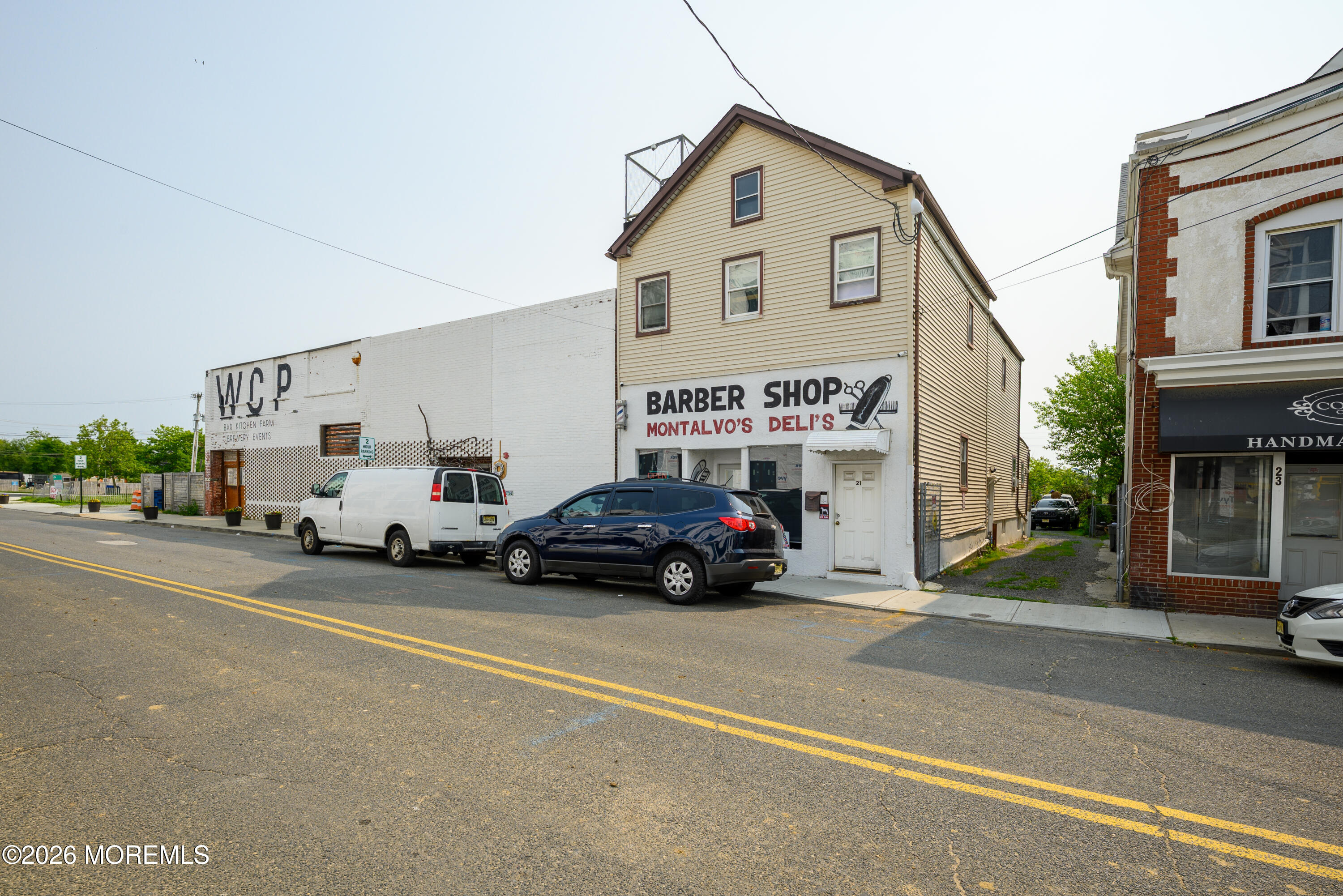 2nd Avenue, Unit 2 Long Branch, NJ 07740 - Photo 5 of 32 a view of a cars parked in front of a building
