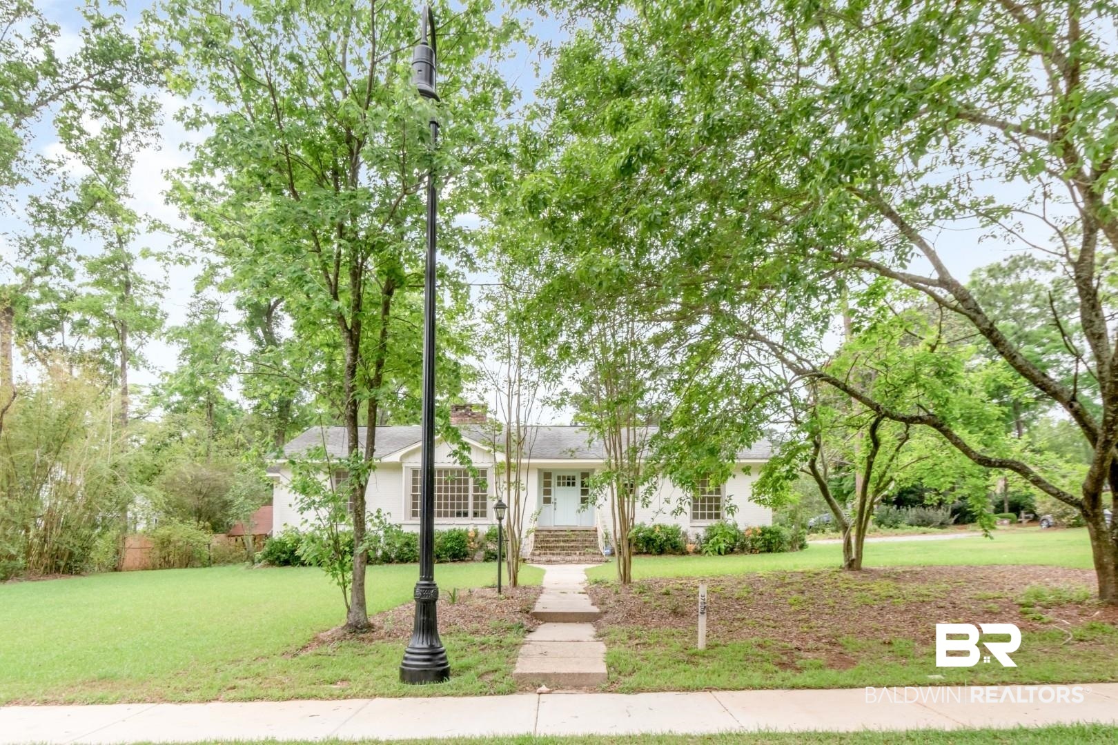 4 Turnout Lane Mobile, AL 36608 - Photo 43 of 53 View of front of house with a front yard and stucco siding
