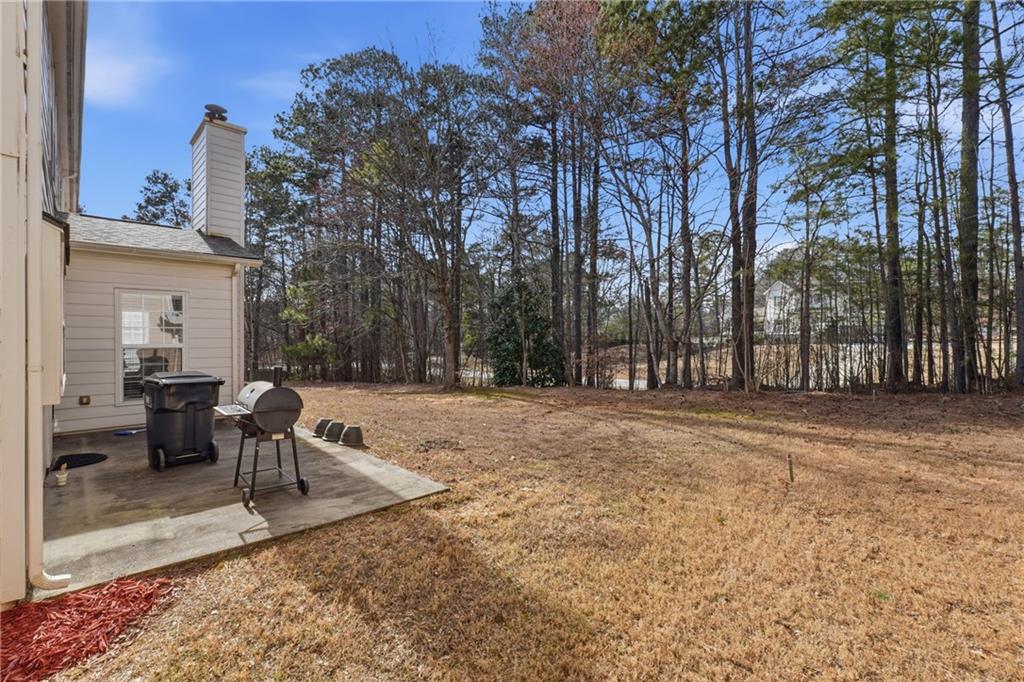 38 Crystal Downs Way Northeast Suwanee, GA 30024 - Photo 38 of 44 a view of outdoor space with seating