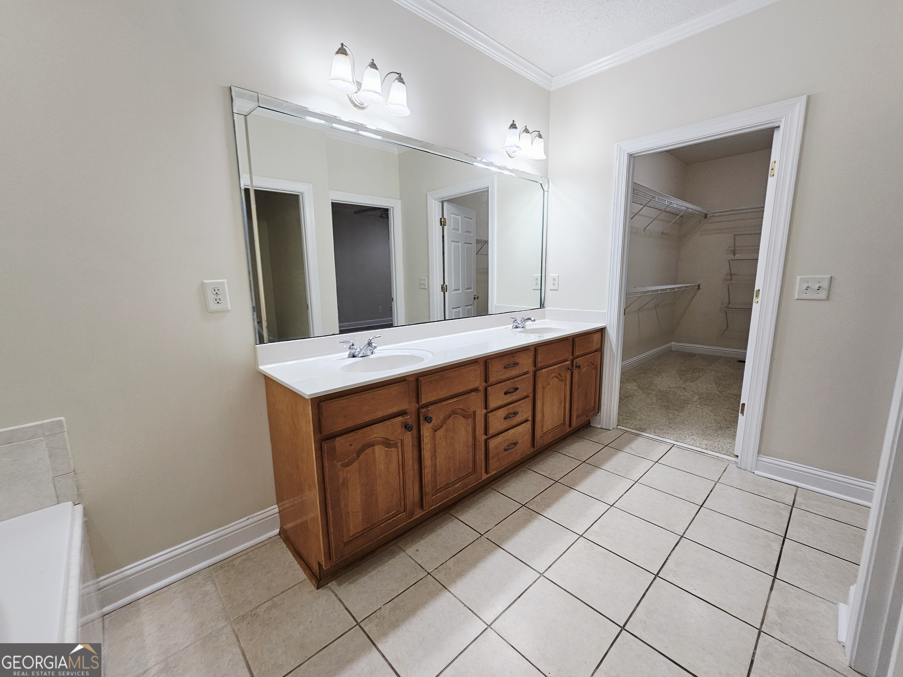122 High Ridge Drive Macon, GA 31220 - Photo 13 of 25 a bathroom with a double vanity sink and mirror