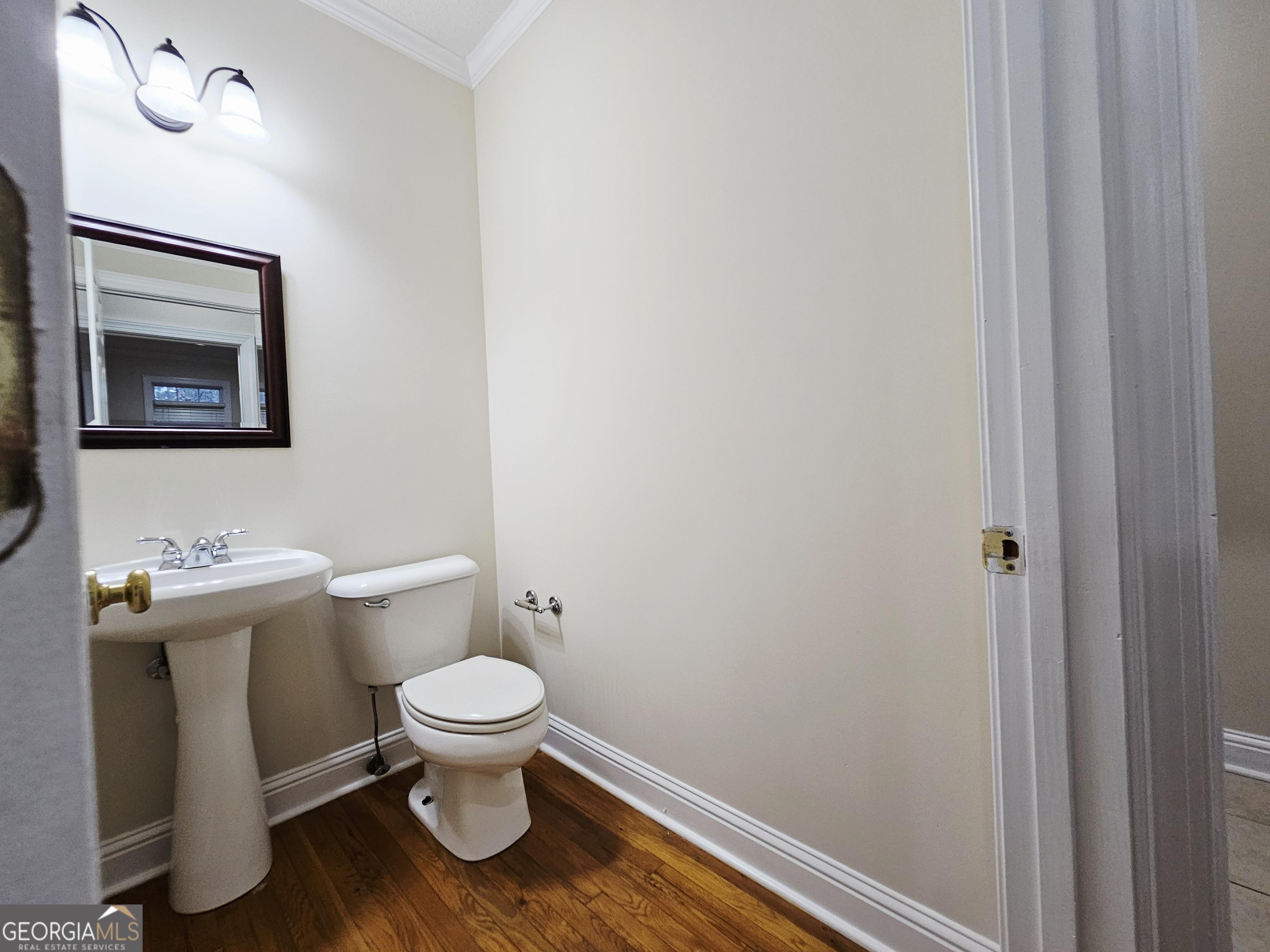 122 High Ridge Drive Macon, GA 31220 - Photo 15 of 25 a bathroom with a toilet and a sink