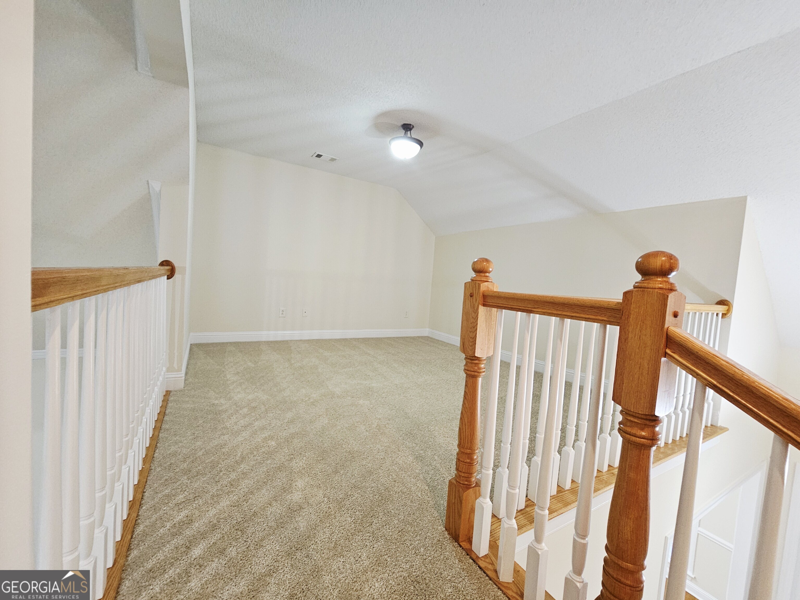 122 High Ridge Drive Macon, GA 31220 - Photo 18 of 25 a view of a hallway with staircase