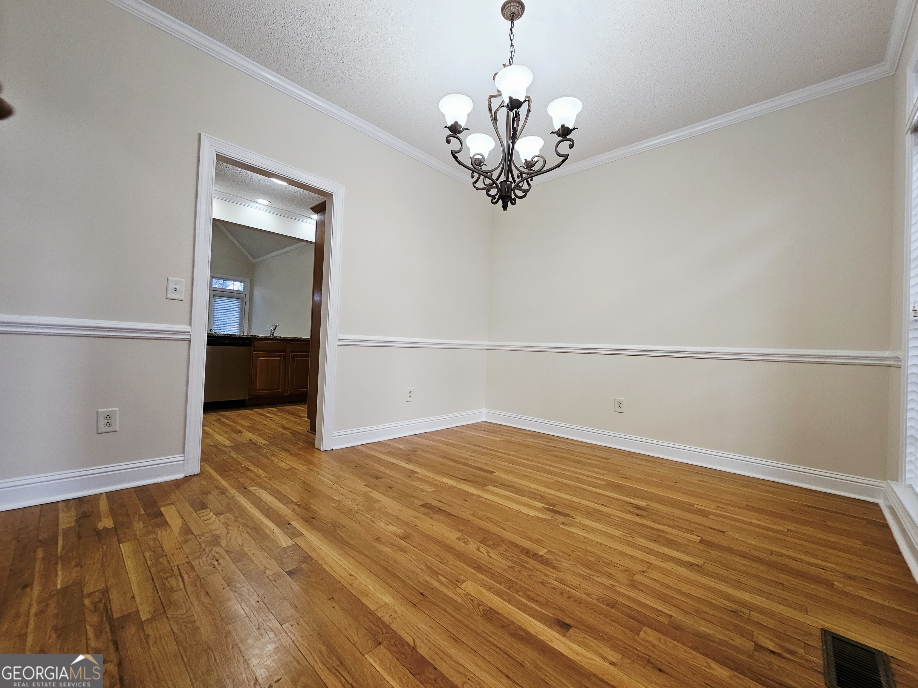 122 High Ridge Drive Macon, GA 31220 - Photo 6 of 25 a view of empty room with wooden floor