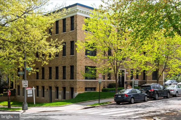 a front view of a building with street view