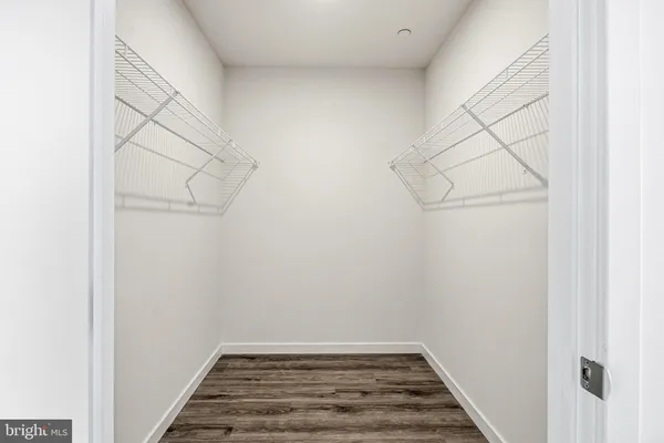 a view of a room with racks on the wall