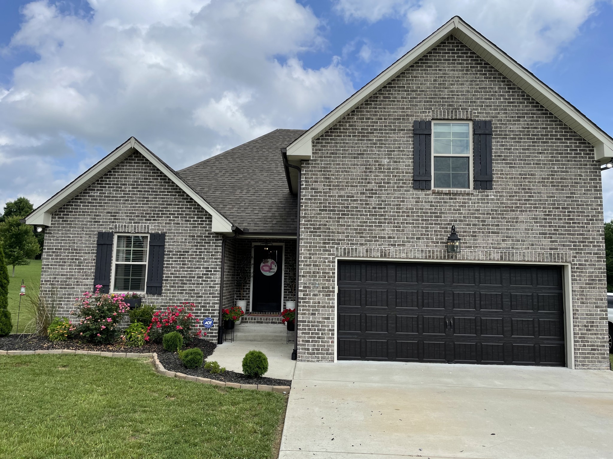 338 Tom Ferrell Road Portland, TN 37148 - Photo 1 of 26 a front view of house with yard