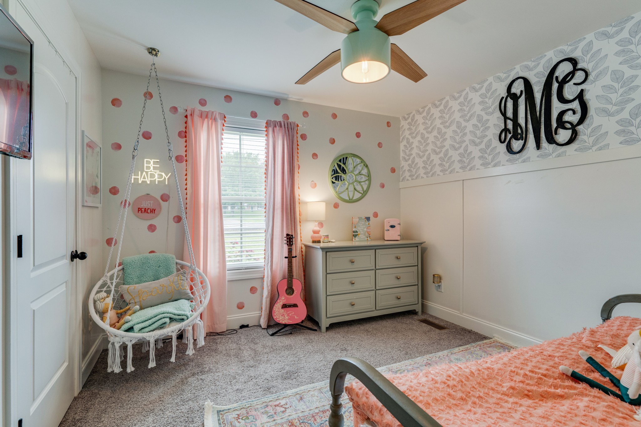 338 Tom Ferrell Road Portland, TN 37148 - Photo 17 of 26 a bedroom with a bed and a chandelier