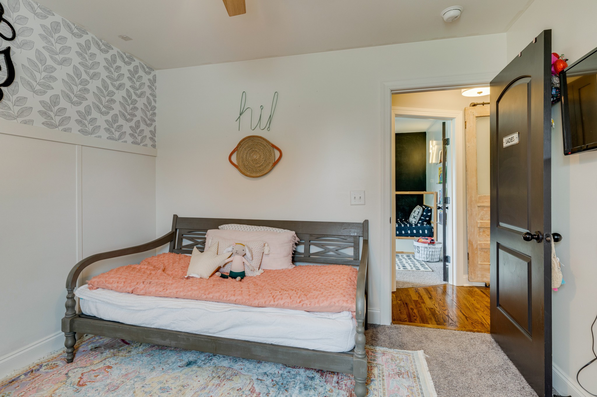 338 Tom Ferrell Road Portland, TN 37148 - Photo 18 of 26 a bedroom with a bed and a window