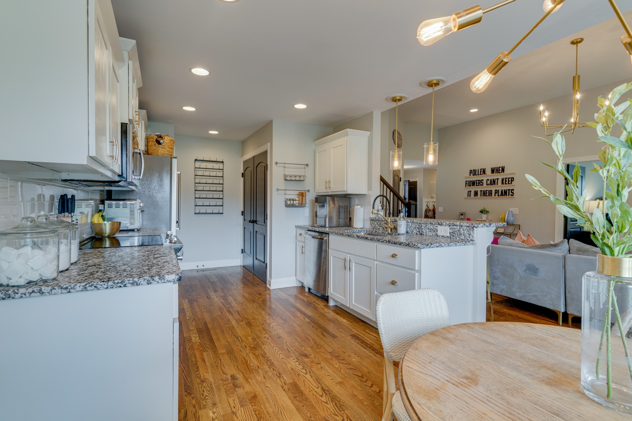 338 Tom Ferrell Road Portland, TN 37148 - Photo 10 of 26 a large kitchen with kitchen island a sink stainless steel appliances and cabinets