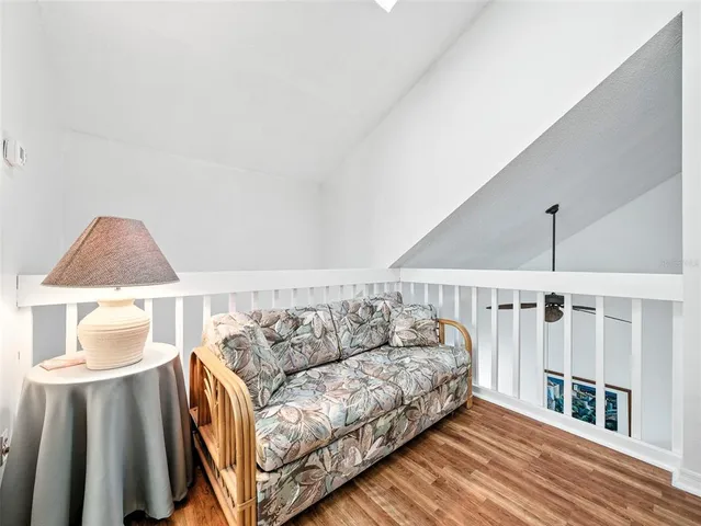 a view of living room with furniture and floor
