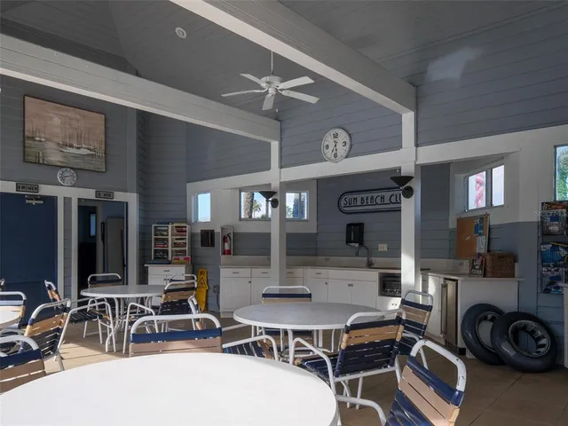 a view of a street sign on the side of the building