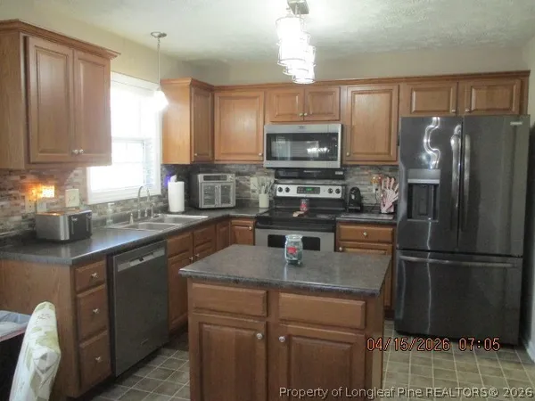 $439,900 | 5721 Royal Farms Road, Wade, NC 28395