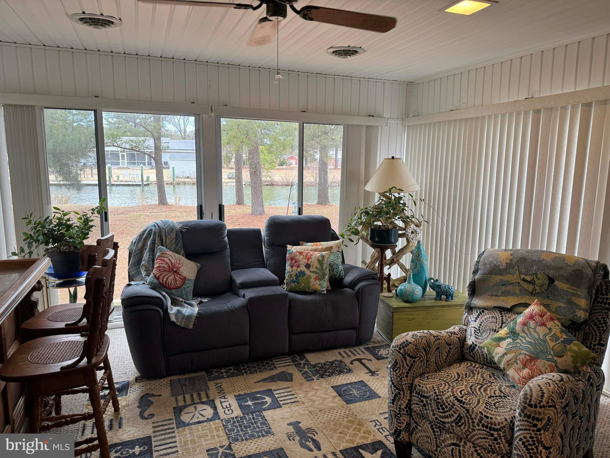 5000 Joshua Thomas Road Marion Station, MD 21838 - Photo 25 of 77 a living room with furniture and a large window