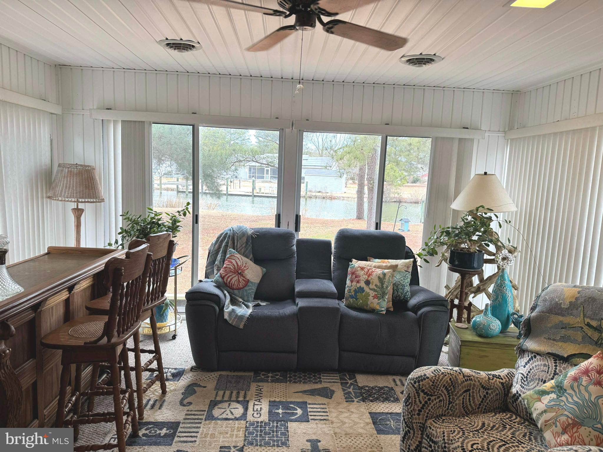 5000 Joshua Thomas Road Marion Station, MD 21838 - Photo 27 of 81 a living room with furniture and a large window