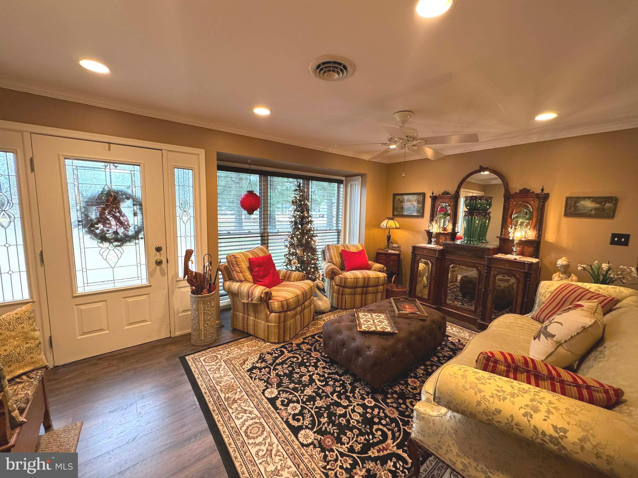 5000 Joshua Thomas Road Marion Station, MD 21838 - Photo 30 of 77 a living room with furniture fireplace and window
