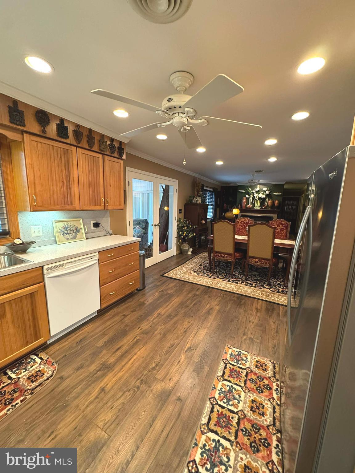 5000 Joshua Thomas Road Marion Station, MD 21838 - Photo 35 of 77 a large white kitchen with a sink and a stove top oven