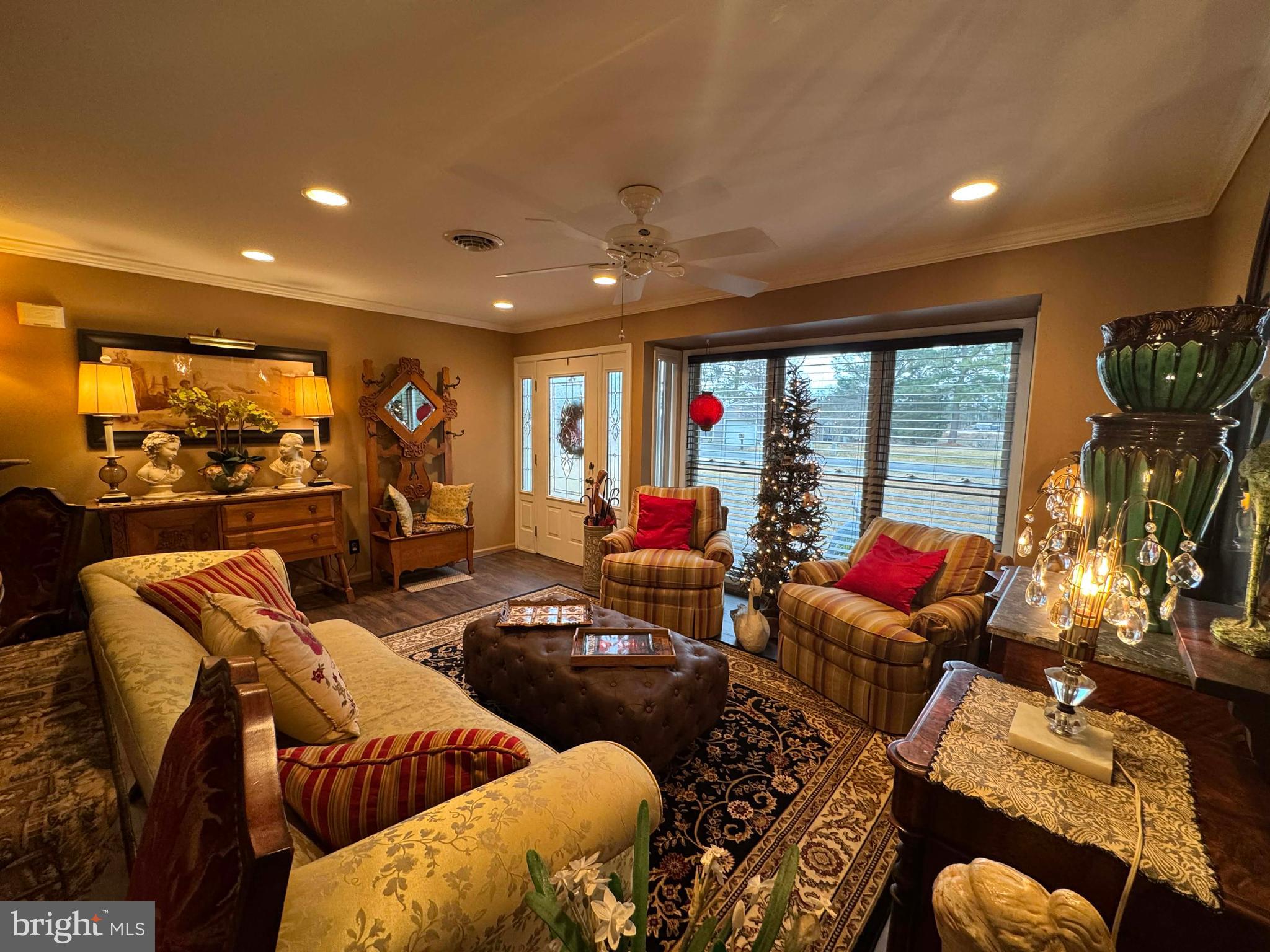 5000 Joshua Thomas Road Marion Station, MD 21838 - Photo 40 of 77 a living room with furniture and a floor to ceiling window