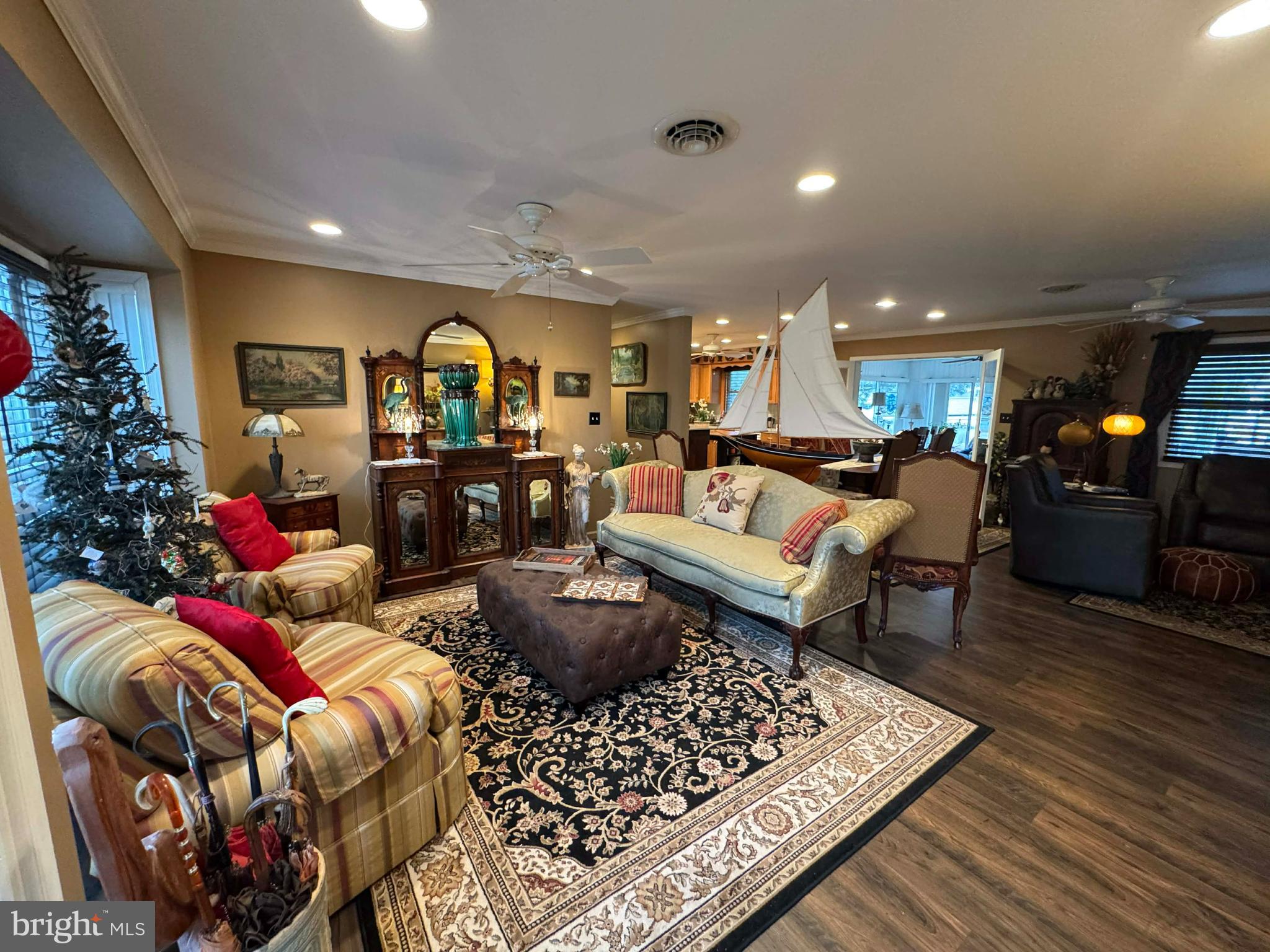 5000 Joshua Thomas Road Marion Station, MD 21838 - Photo 43 of 77 a living room with furniture a rug and a fireplace
