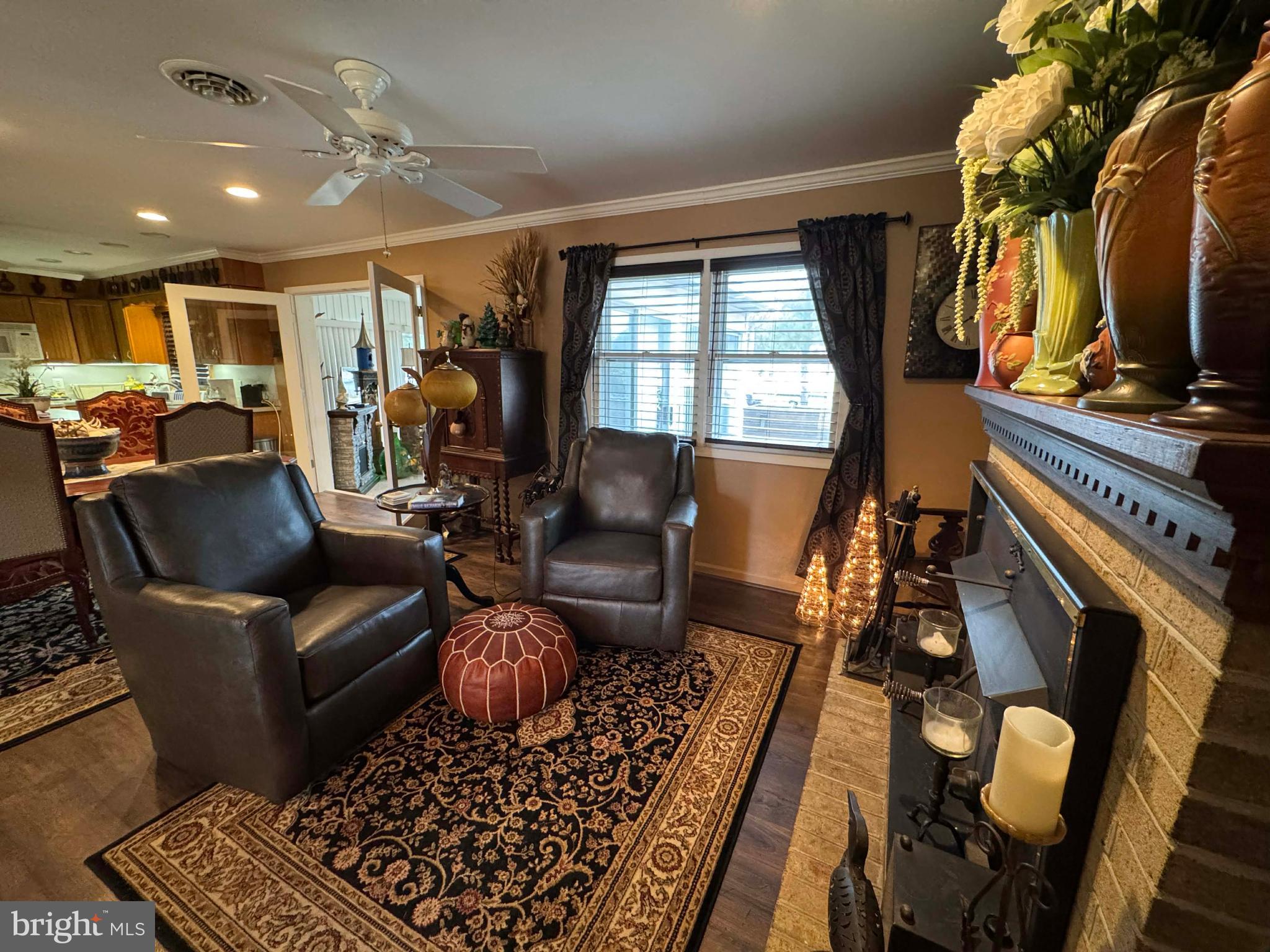 5000 Joshua Thomas Road Marion Station, MD 21838 - Photo 47 of 81 a living room with furniture and a floor to ceiling window
