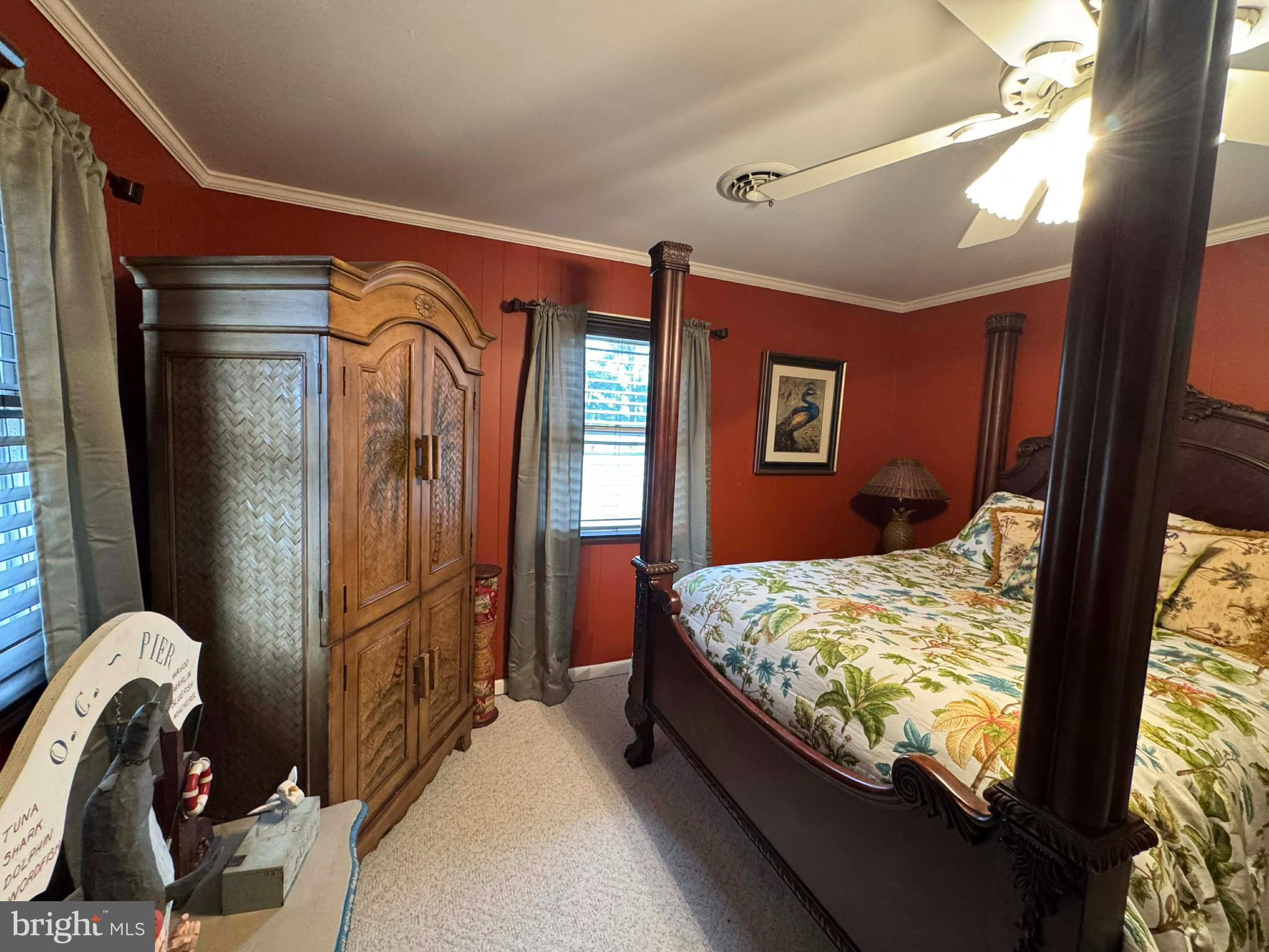 5000 Joshua Thomas Road Marion Station, MD 21838 - Photo 47 of 77 a bedroom with bed and sliding door